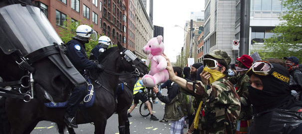 968780_protesters-confront-police-officers-at-a-demonstration-during-the-annual-general-meeting-of-power-corporation-of-canada-in-montreal.jpg