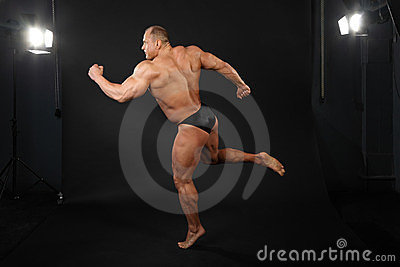 bodybuilder-takes-graceful-pose-running-24227501.jpg